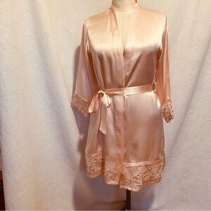 Pure silk pale pink robe with lace trim.